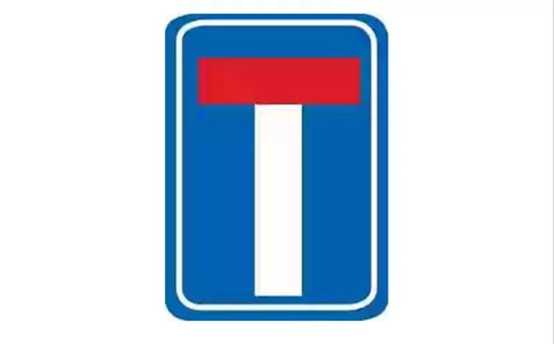 后来在网上一查才知道,这个大"t"指的是"此路不通的标志!