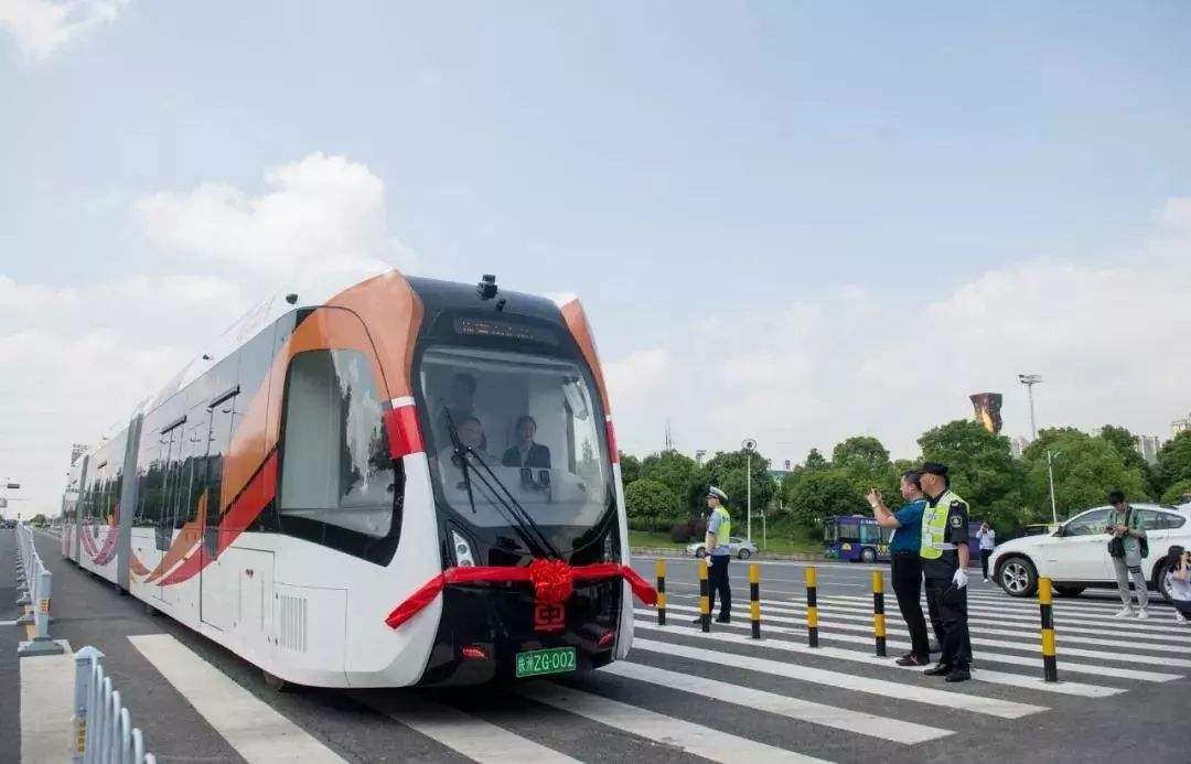 參觀株洲動力谷智軌列車湘火炬火花塞三大企業揭秘株洲工業企業發展