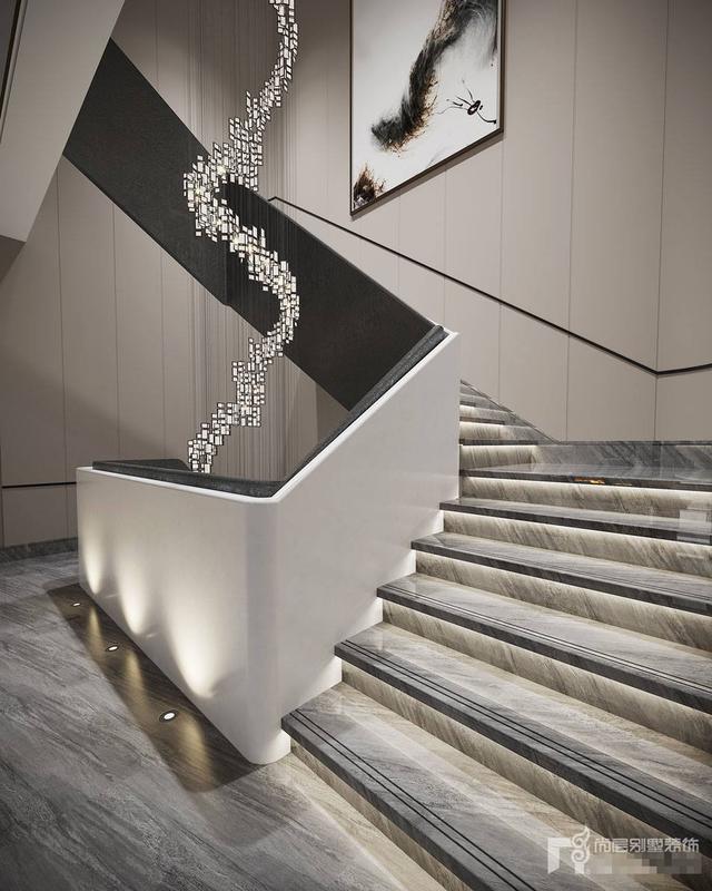 楼梯间茶室走进客厅,从大理石墙面到斑斓的地毯,在整体上以天然的饰面