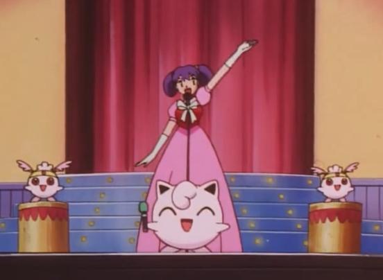 菲洛在舞台上演唱的《暑假迷俱乐部》和小刚登台演唱的《小刚的乐园》