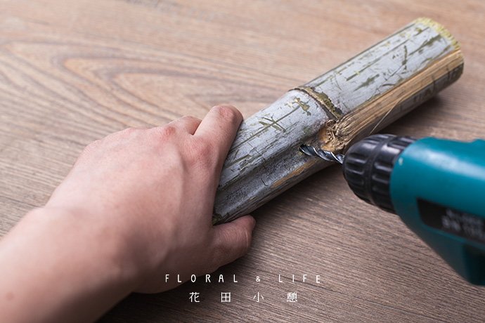的竹子,根据作品的需要裁剪成合适的长度,并用电钻在底部打出一个圆孔