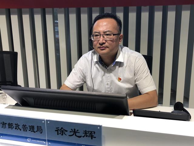 市邮政管理局局长徐光辉切实做好快递小哥权益保障