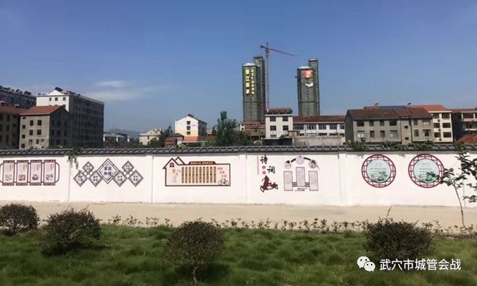 污点变亮点武穴城区一小区居民自发筹款建小区文化墙