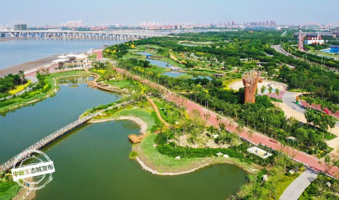 天津工人报俯瞰生态城南堤滨海步道美景初现