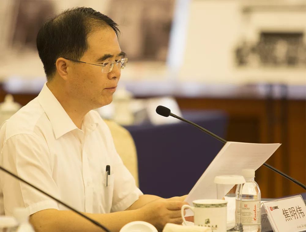 规划局副局长滕军红主持,青岛市市北区区委常委,常务副区长焦明伟致辞