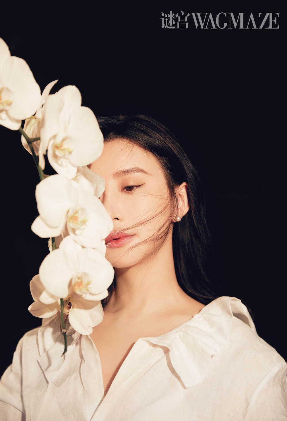 熊乃瑾完美诠释花系女子 探索内心的秘密花园