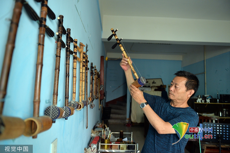 山东聊城绵绵丝竹伴琴情探访手工京胡制作艺人