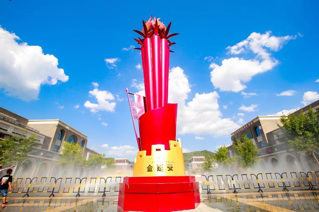 因为金延安曾举办"重走长征路——纪念长征胜利80周年全国"火炬汇集