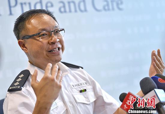 中新社记者 麦尚旻 摄警察公共关系科总警司谢振中指出,6月的示威活动