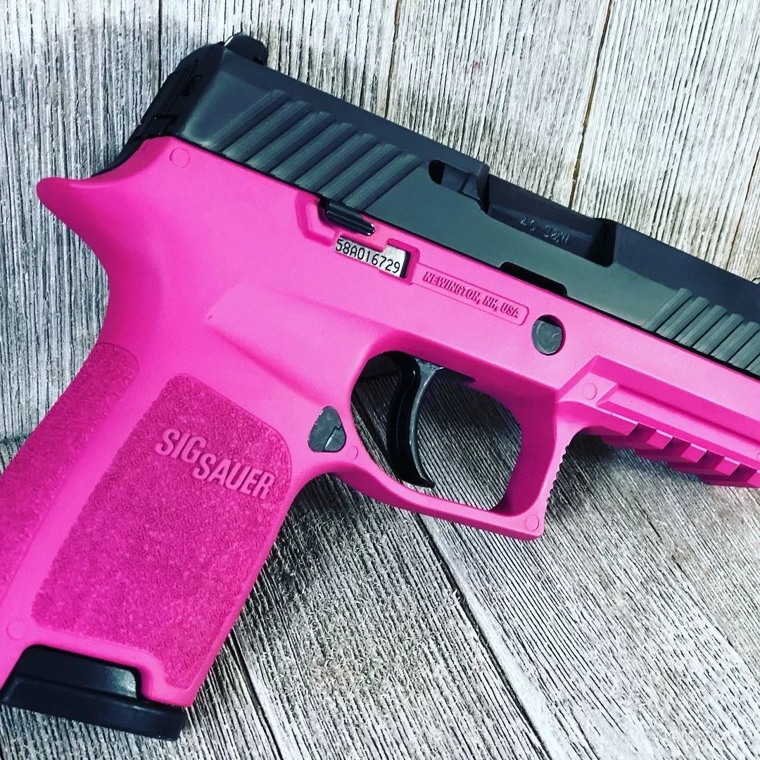 粉色枪械面若桃花艳若桃李