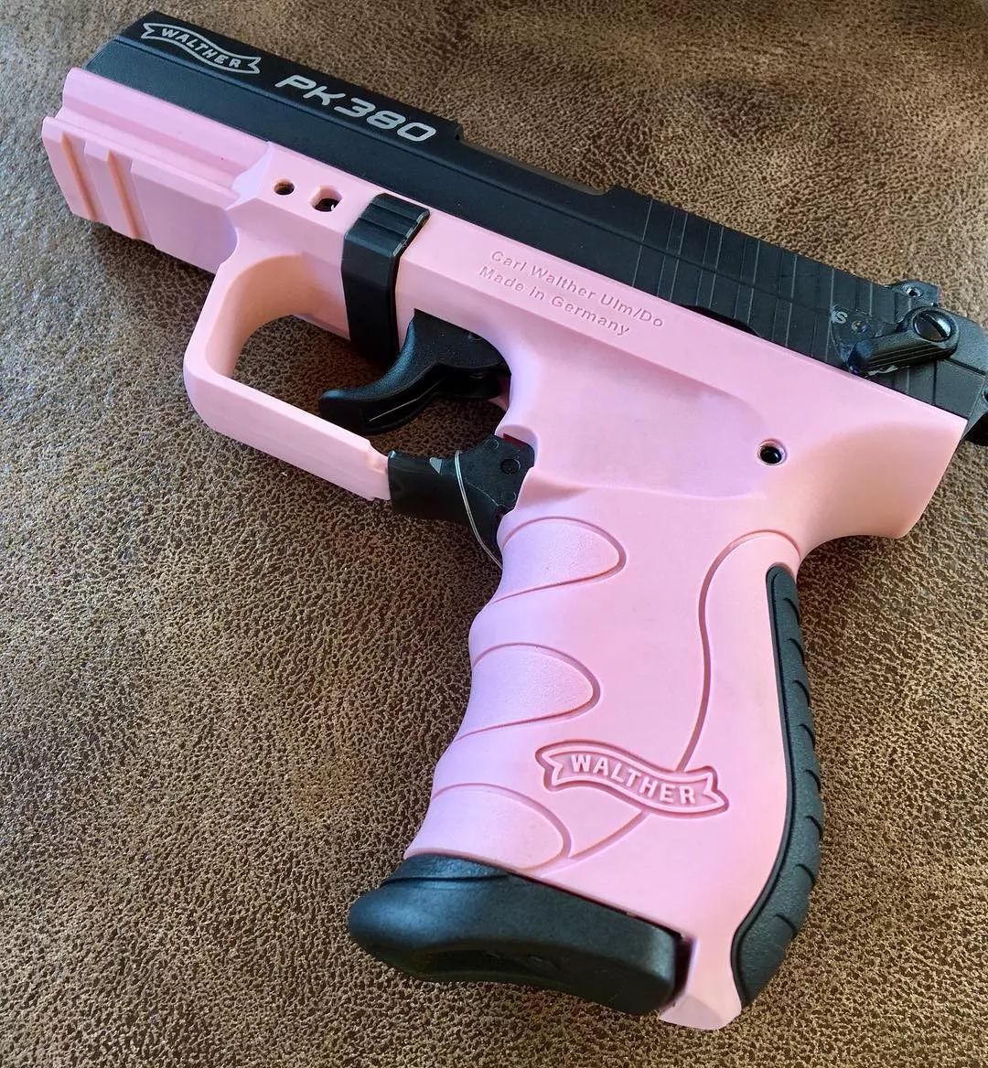 粉色枪械面若桃花艳若桃李