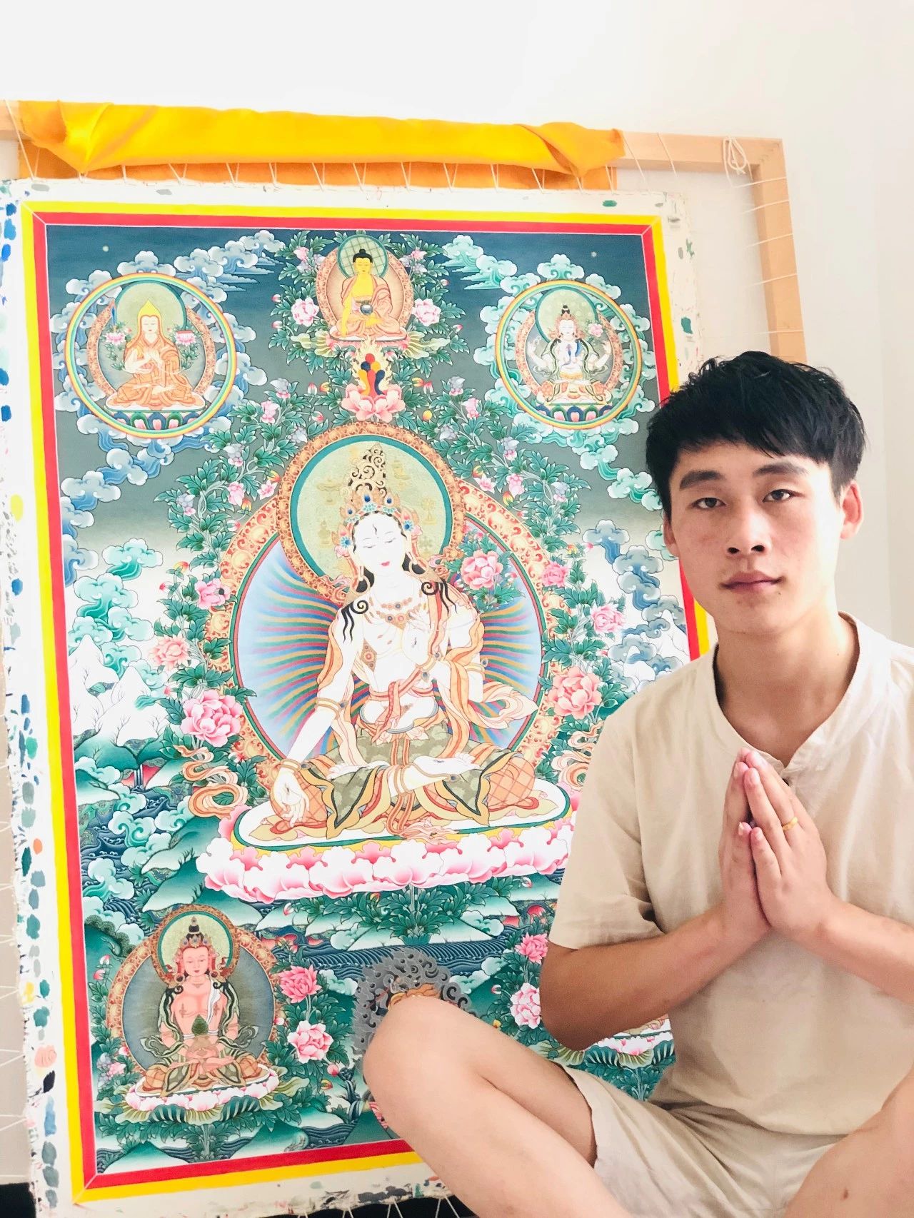 这位90后青年一直把传承唐卡视为自己毕生的事业