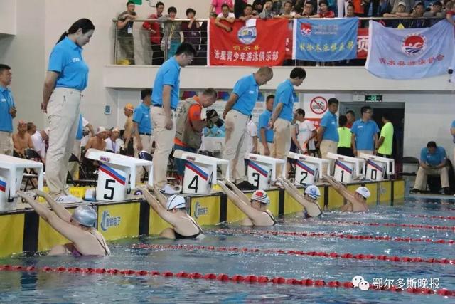 比赛现场,有来自浙江,辽宁,北京,中国香港,澳门等地的52支游泳代表队