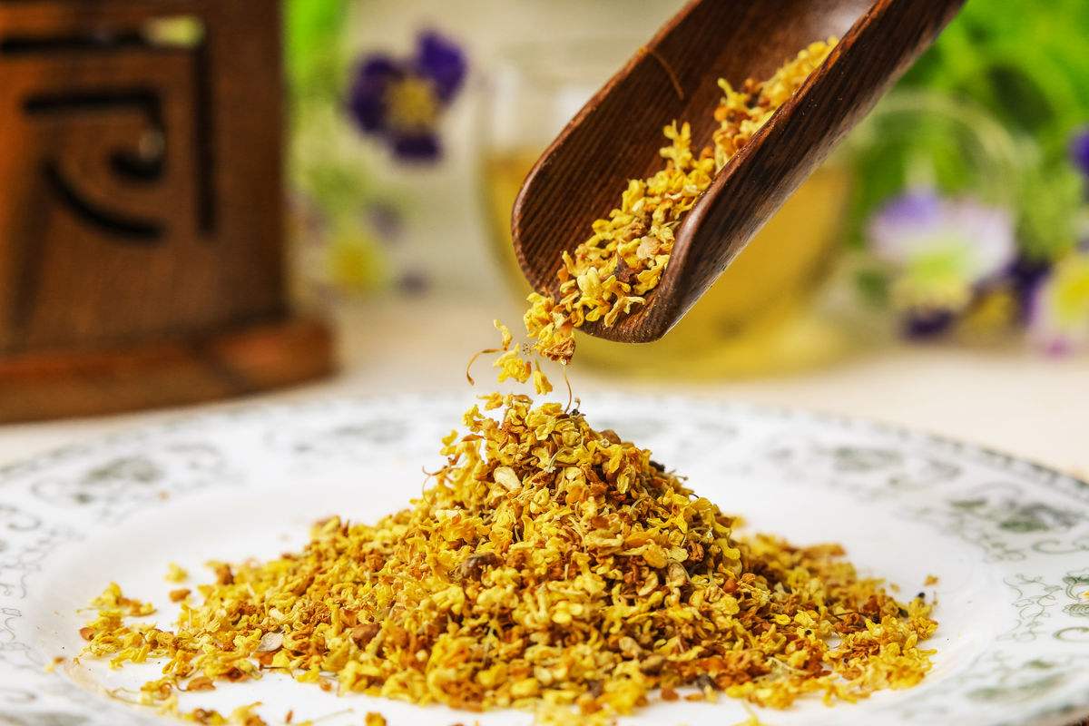 2,1桂花茶的功效是温补阳气美白肌肤排解体内毒素止咳化痰养生润肺