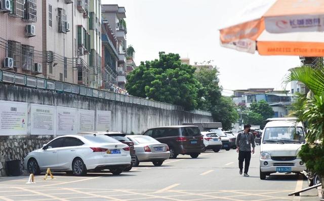 番禺南郊村公共车位被私用村里的回应来了