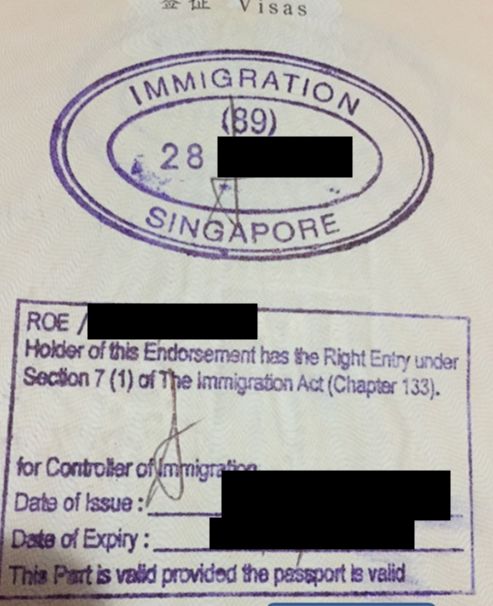 惊有人拿两本护照出入境新加坡允许双重国籍吗