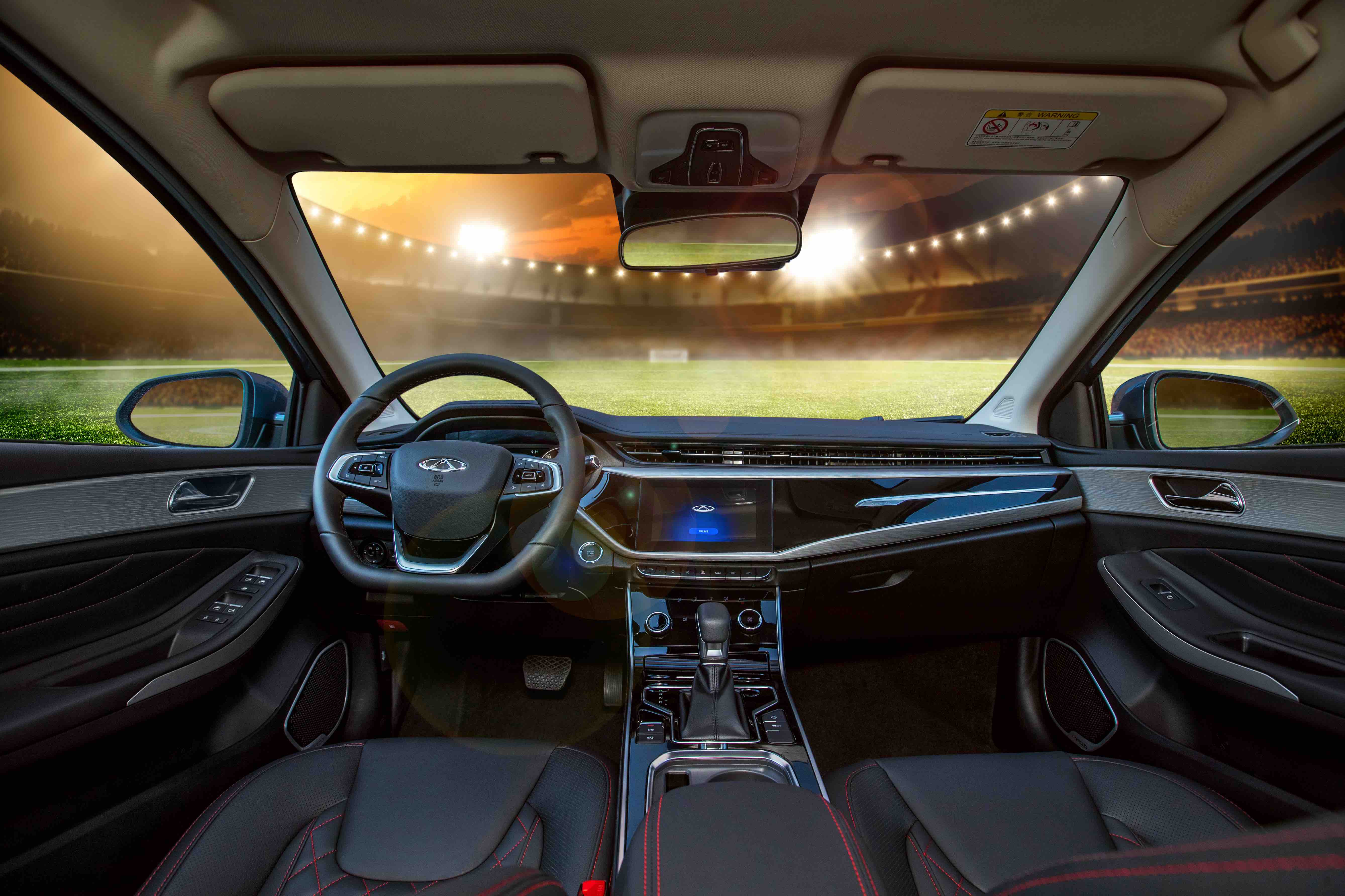 艾瑞泽gx冠军版的内饰设计以驾驶者为中心,采用由液晶仪表,中控屏以及