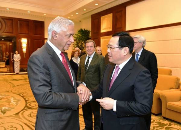 李强今天会见这个知名金融企业的国际智囊