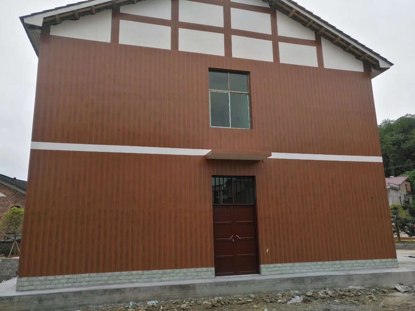 外墙混凝土仿木纹漆施工案例