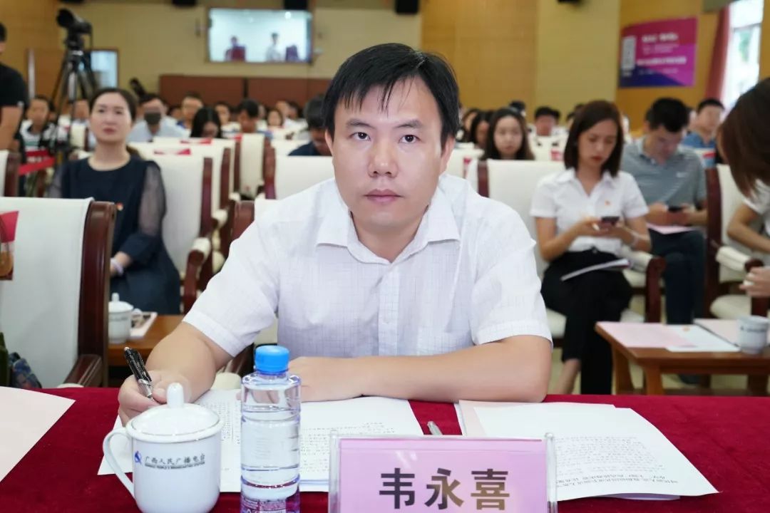 自治区扶贫办政研督察处副处长韦永喜广西广播电视台经济广播(fm97.