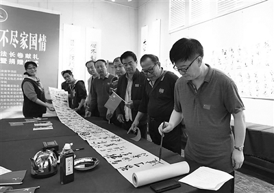 张建亚七十米书法长卷献礼新中国七十华诞