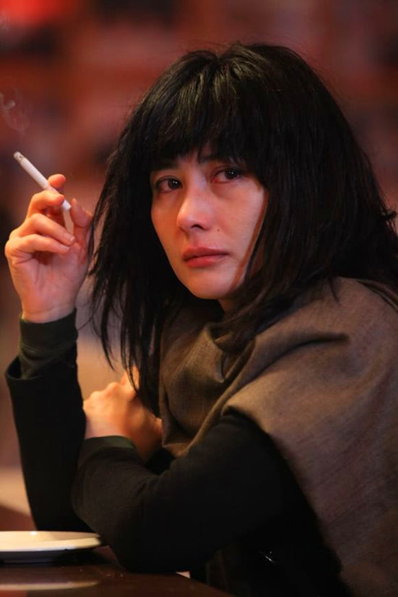 何超仪,凭借《紫雨风暴》获得金马奖最佳女配角,还有她在电影《豪情》