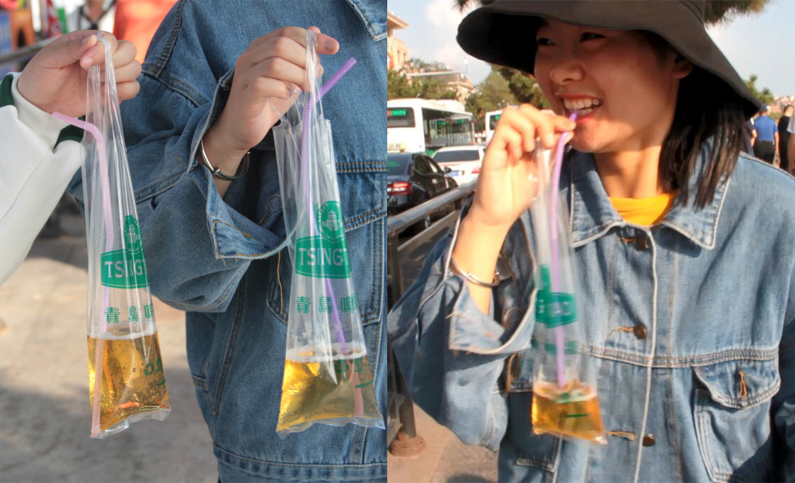 原创青岛小袋装啤酒走红女游客边走边用吸管喝