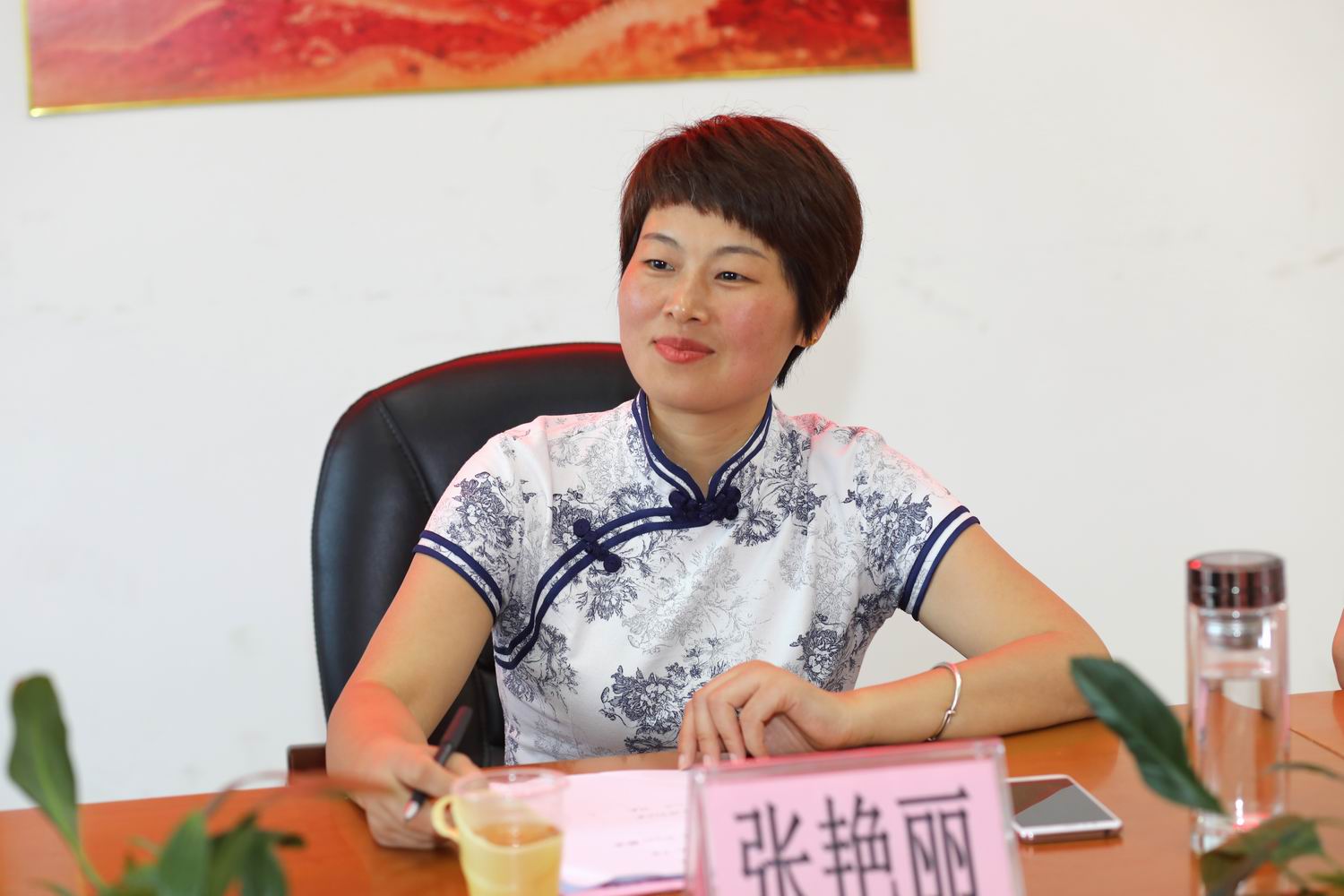 张旭校长先介绍《廉江中学赋》的创作背景.