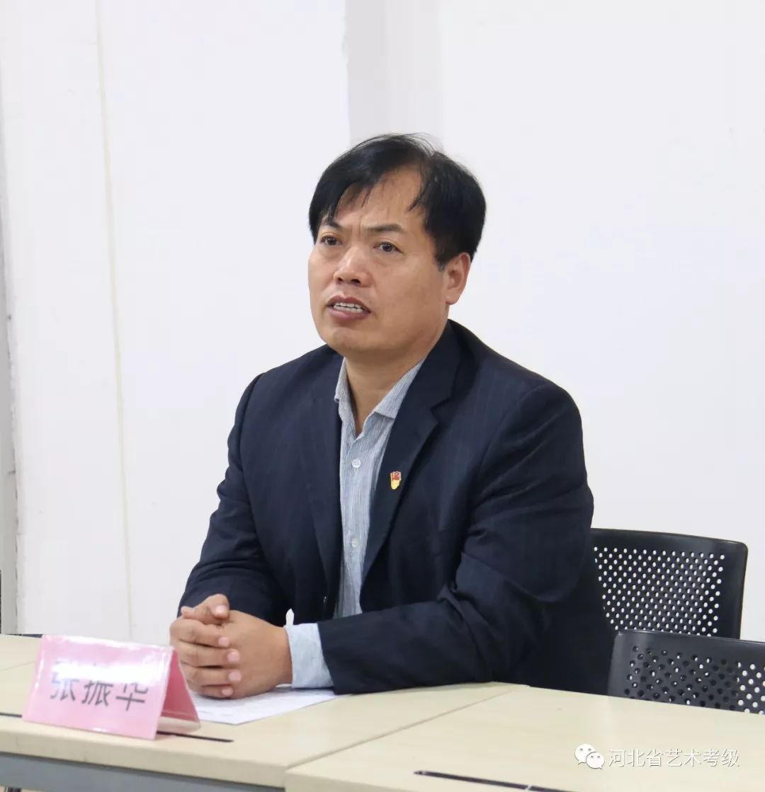 高新区社会发展局局长张振华,河北省艺术考级中心主任曹晓林,副主任