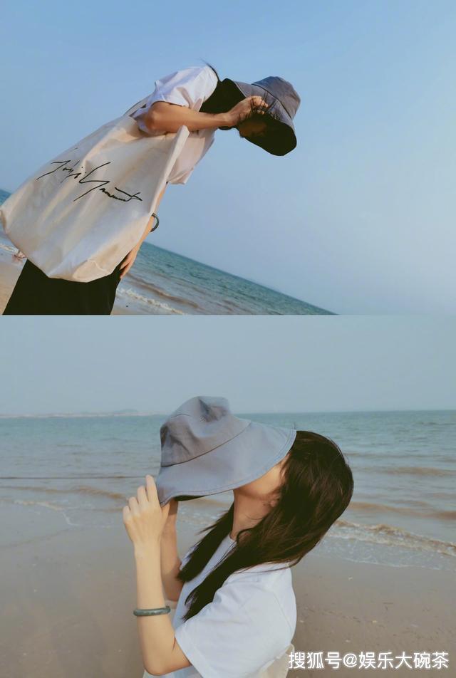 原创谭松韵晒日常游客照一身简约装扮漫步海边风吹秀发也透着可爱