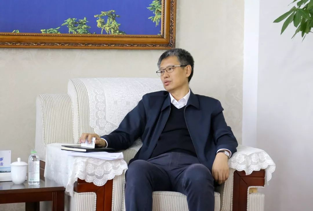 张旭东会见光大银行侯胜才一行