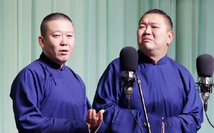 左程磊 右徐宇泽程磊青年相声,快板演员,北京曲艺家协会会员,中国快板