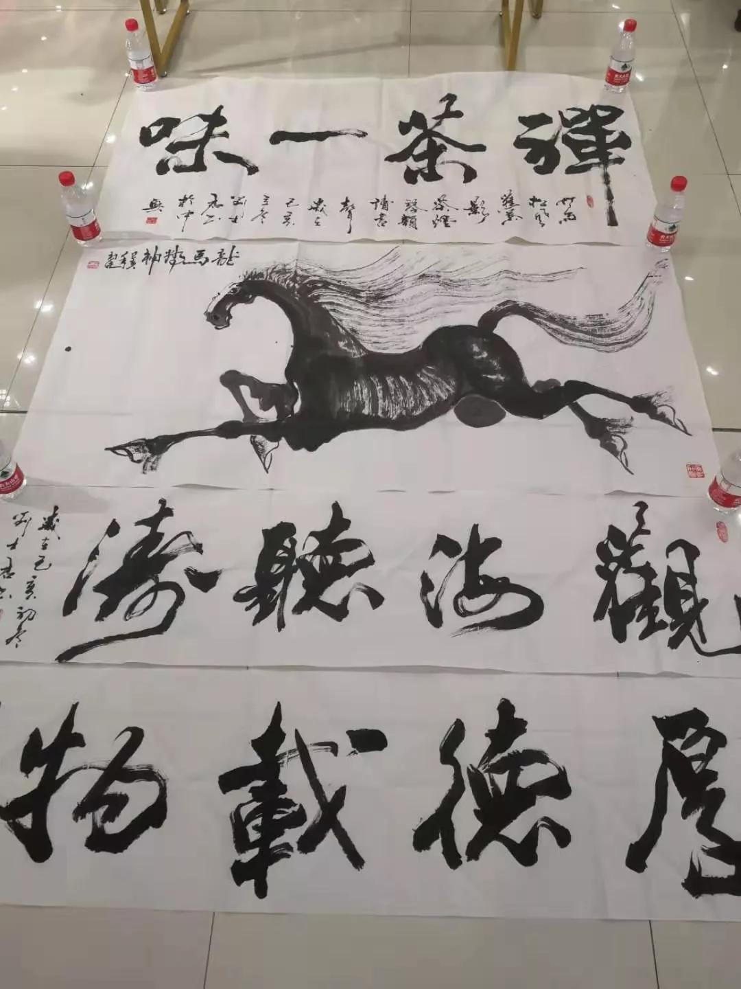 刘明奇到沈阳助力羊绒皮革节_书法