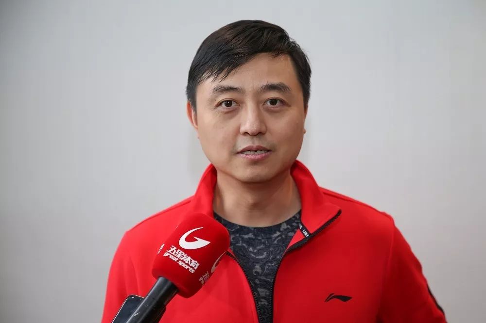 上海围棋队教练 刘世振"我们报名参赛的七个运动员中,有小学生,中学生