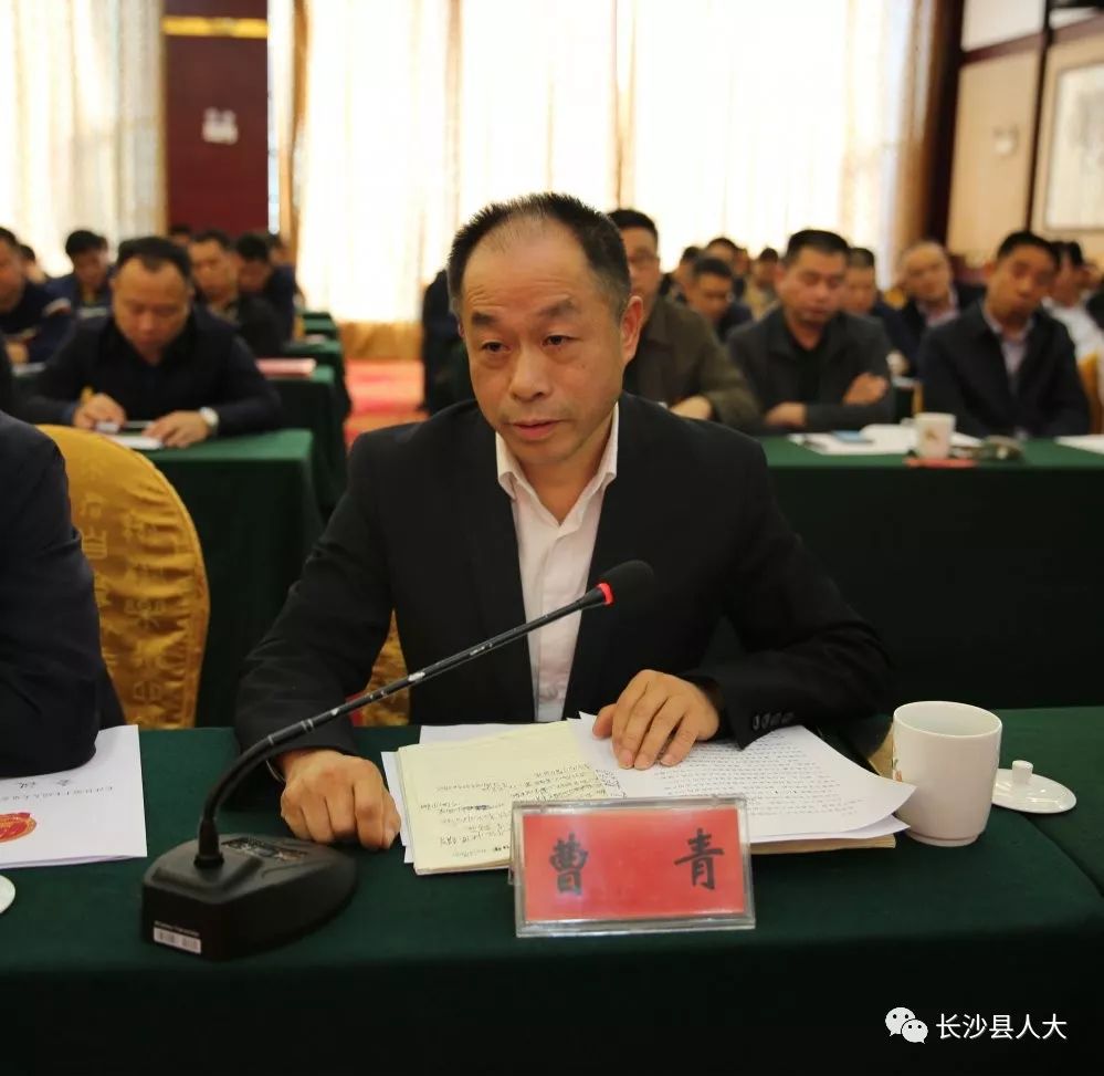 有关107国道毛塘铺路段的设施问题,拟采取设置中心护栏的方式杜绝大货