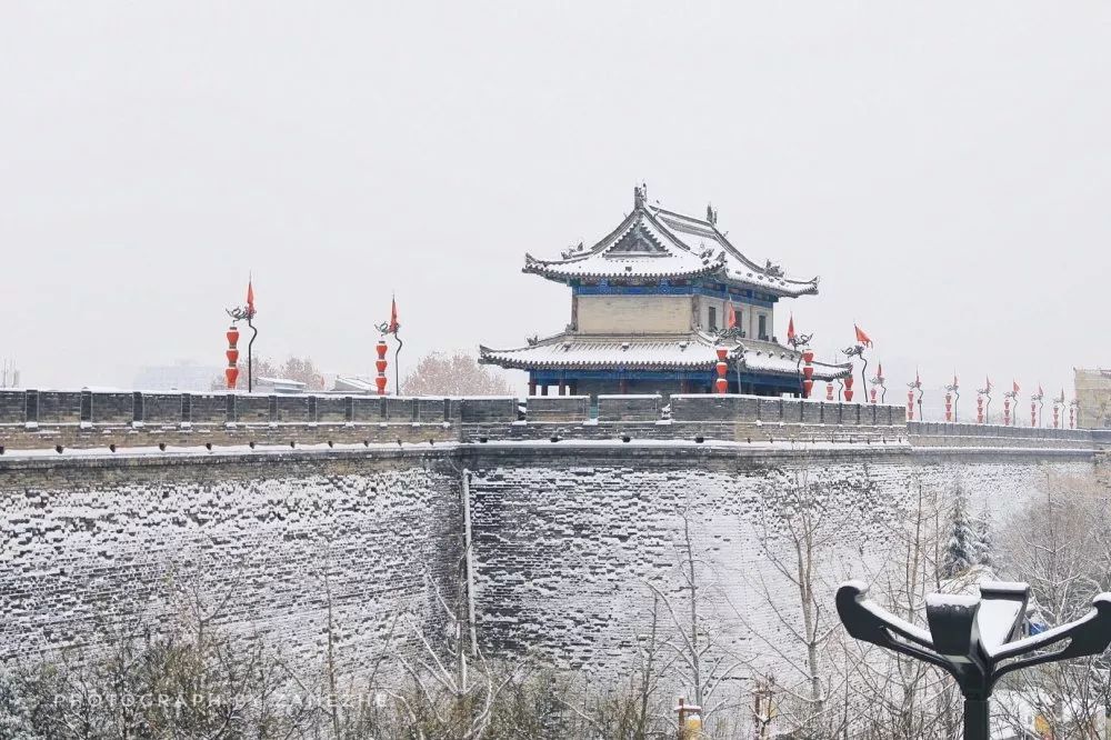 一朝长安雪半梦醉人间