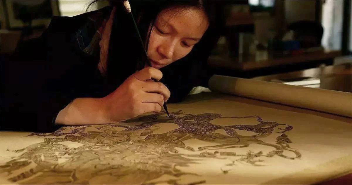 埋头创作的汪化