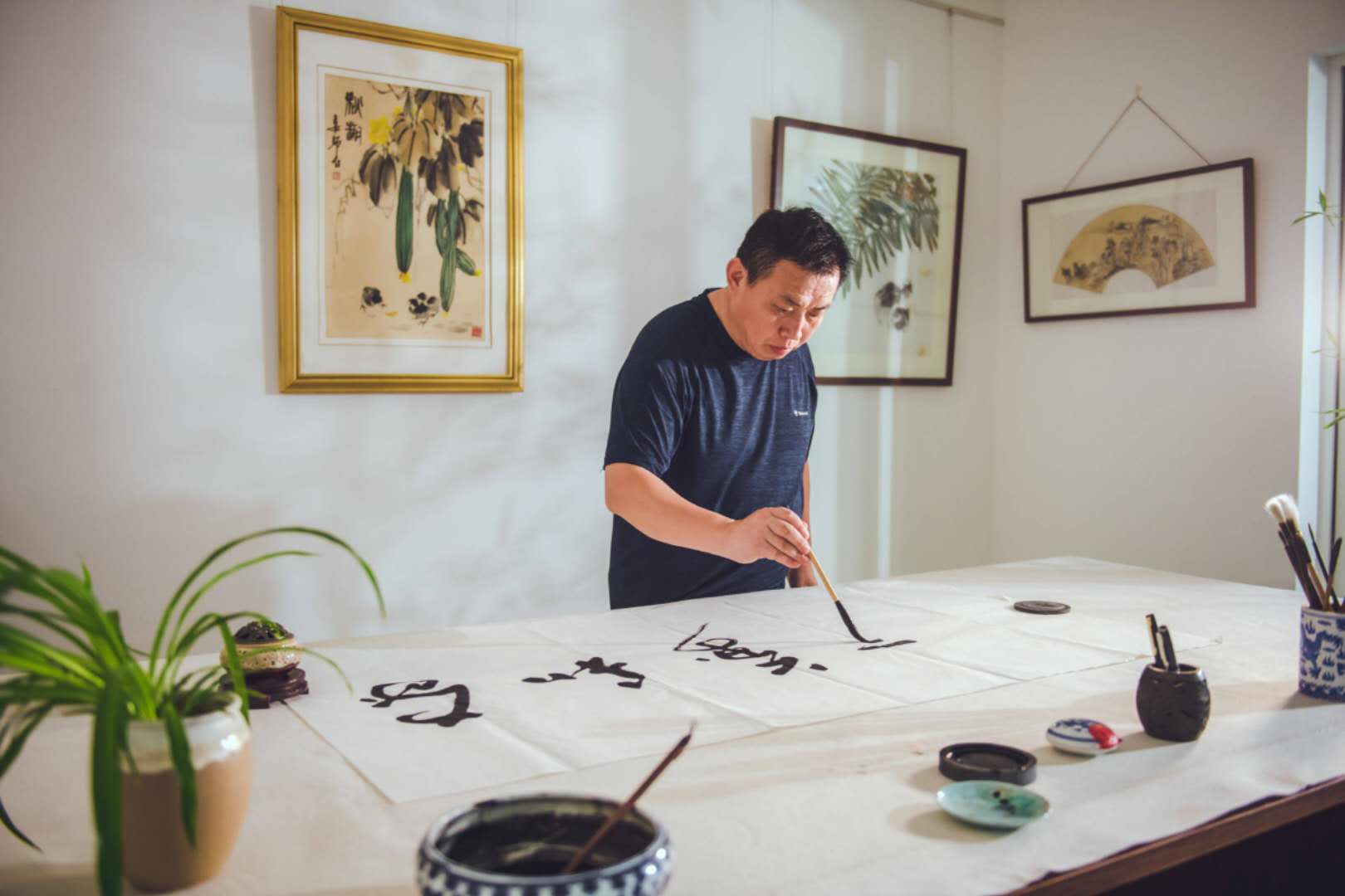 聊城多家企事业单位邀请青年书法家谢玉明挥毫