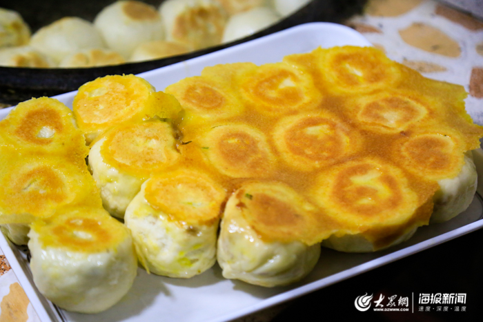 这就是山东丨咬一口黄澄澄的利津水煎包品味冬日里的黄河口风情