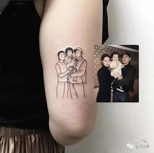 纹身抱孩子的图片图片