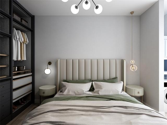 主卧空间同样以灰色和白色为基调,整体慵懒舒适,灰色系床品与床头