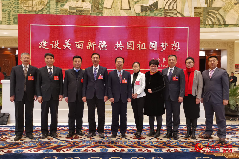 新疆维吾尔自治区政协十二届三次会议开幕(图)