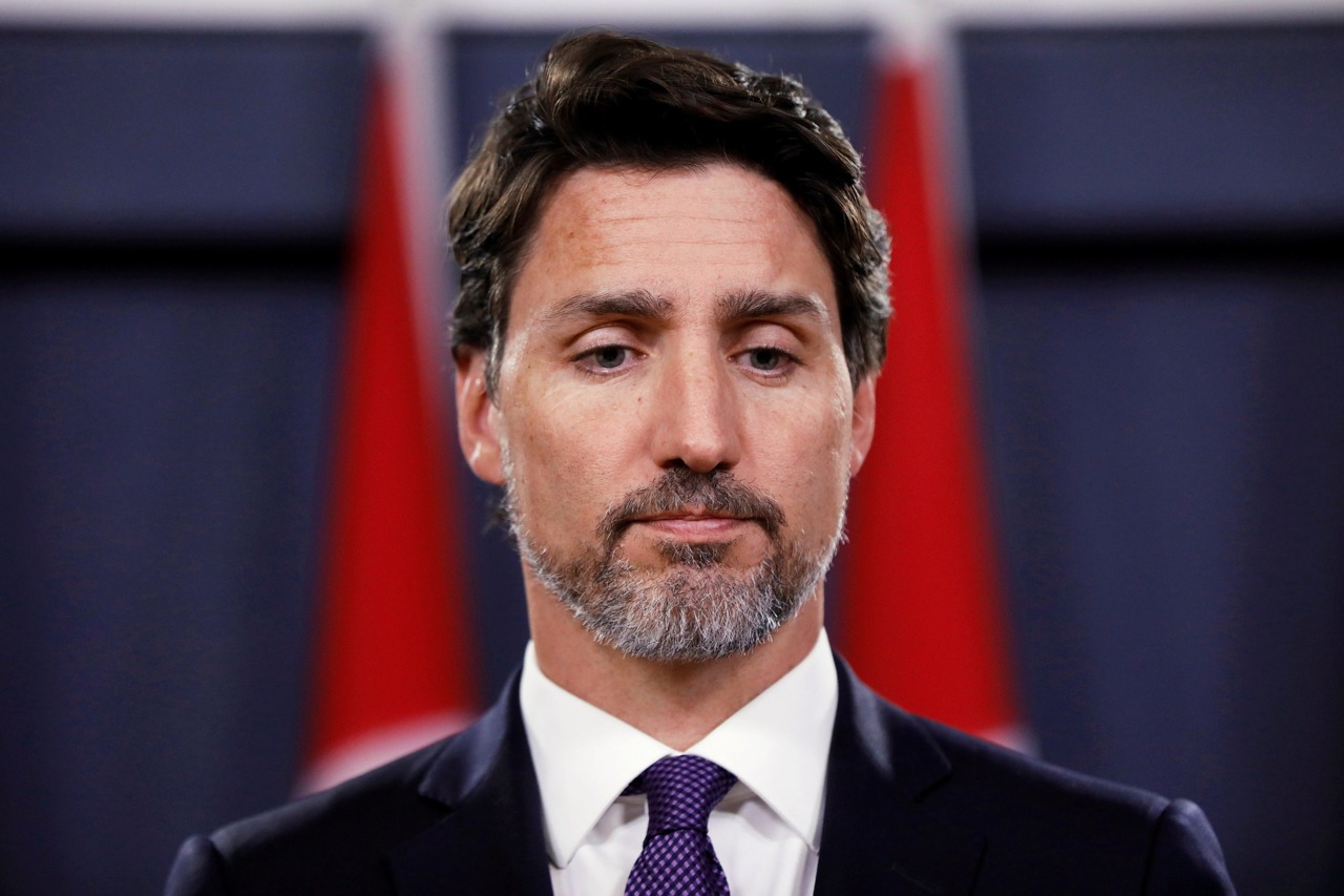 1/ 18 当地时间1月9日下午,加拿大总理特鲁多(justin trudeau,中)在