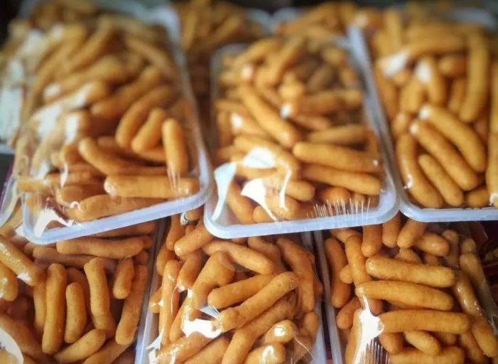 脆子陆川县北的客家人喜欢米花糖,这是他们那边特有的客家文化.