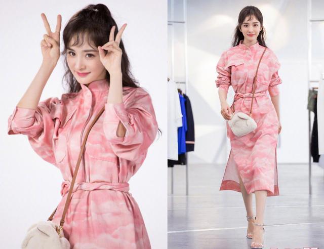 杨幂身穿一件粉红色的裙子,大扎扎马尾还有着齐刘海,直接嫩回18岁少女