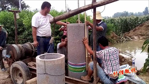 农民自制高速打井机恰巧让村民赶在高温下干活又热又累