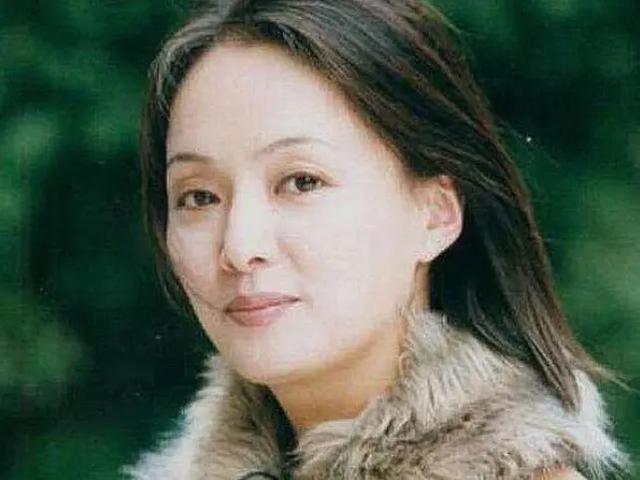 张子强死后,妻子携子女出走美国成大赢家,如今生活怎样?_罗艳芳