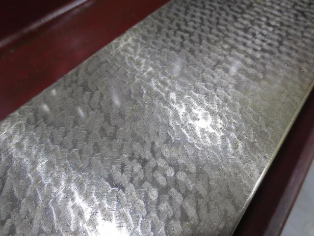 军工领域中依然不能用机器代替人手的工作刮削研