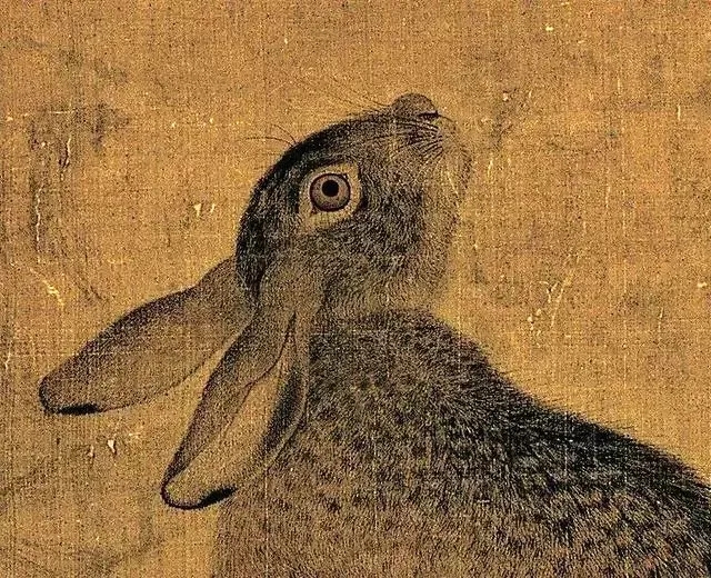 但崔白却选择了深秋的荒野为场景,以疾风劲草,霜叶飘摇,野兔回望,寒鹊