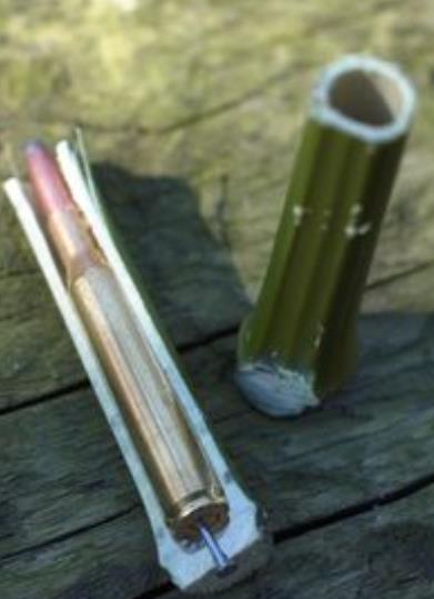 一根钢管底部尖尖里面放一颗子弹专打敌人脚底板